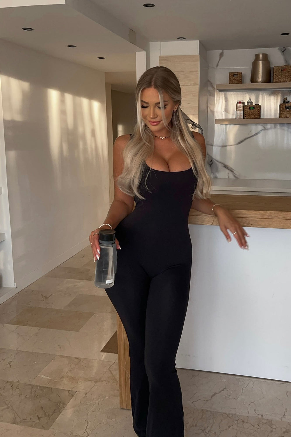 https://cdn.shopify.com/s/files/1/0293/9277/files/11-18-2024__366_Body_Burn_Super_Soft_Active_Jumpsuit_Black_LA.jpg?v=1737756605