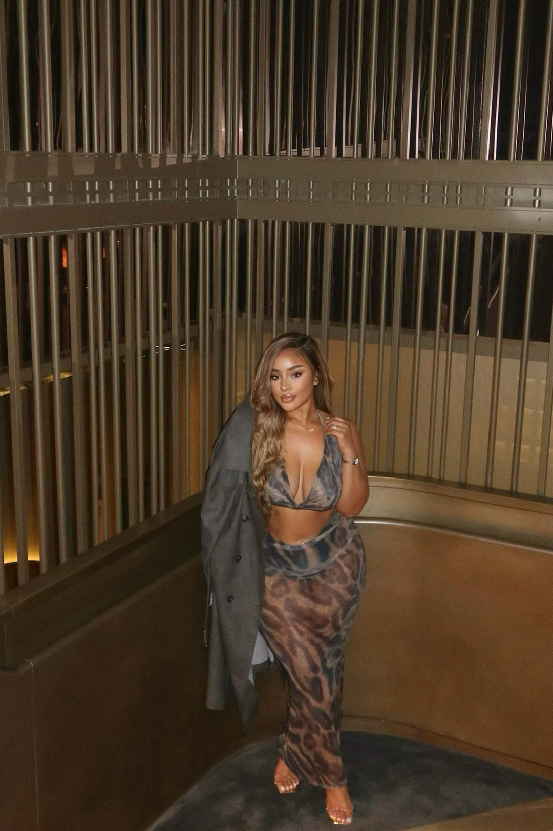 https://cdn.shopify.com/s/files/1/0293/9277/files/11-18-2024__387_Living_Wild_Mesh_Skirt_Set_Leopard_LA.jpg?v=1734107748